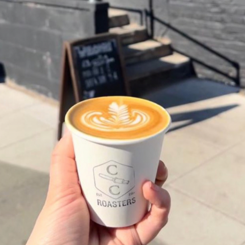 A picture of someone holding a coffee from Crosby Coffee